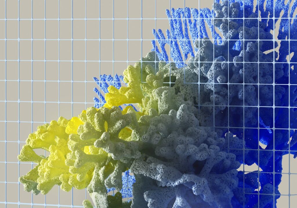 pexels-photo-17484899 Vibrant abstract 3D render featuring colorful coral-like structures against a grid background.